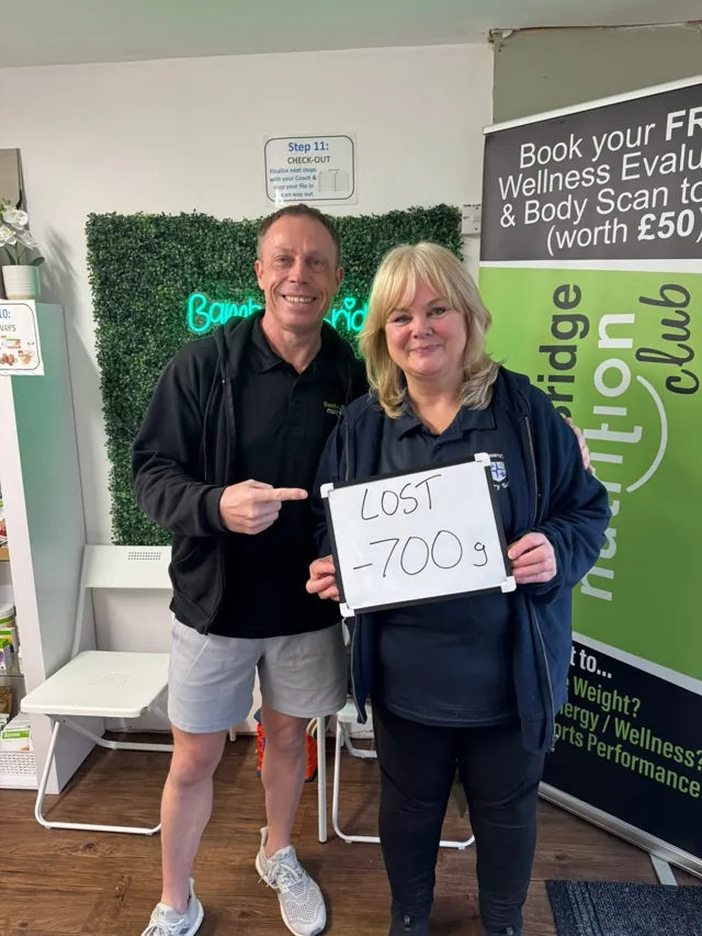 Bamber Bridge Nutrition club coach alongside a member