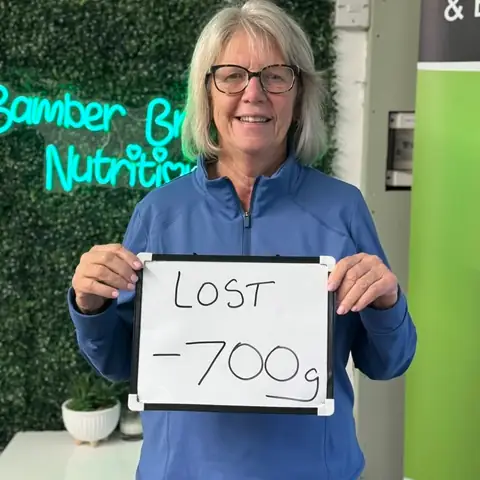 A Bamber Bridge Nutrition club member with her assessment board